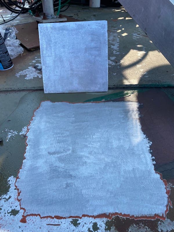 Potable water tank exterior prepared for 5G antenna plate bonding