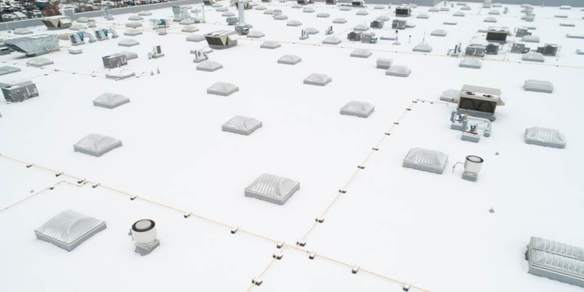 Liquid applied roof coating system